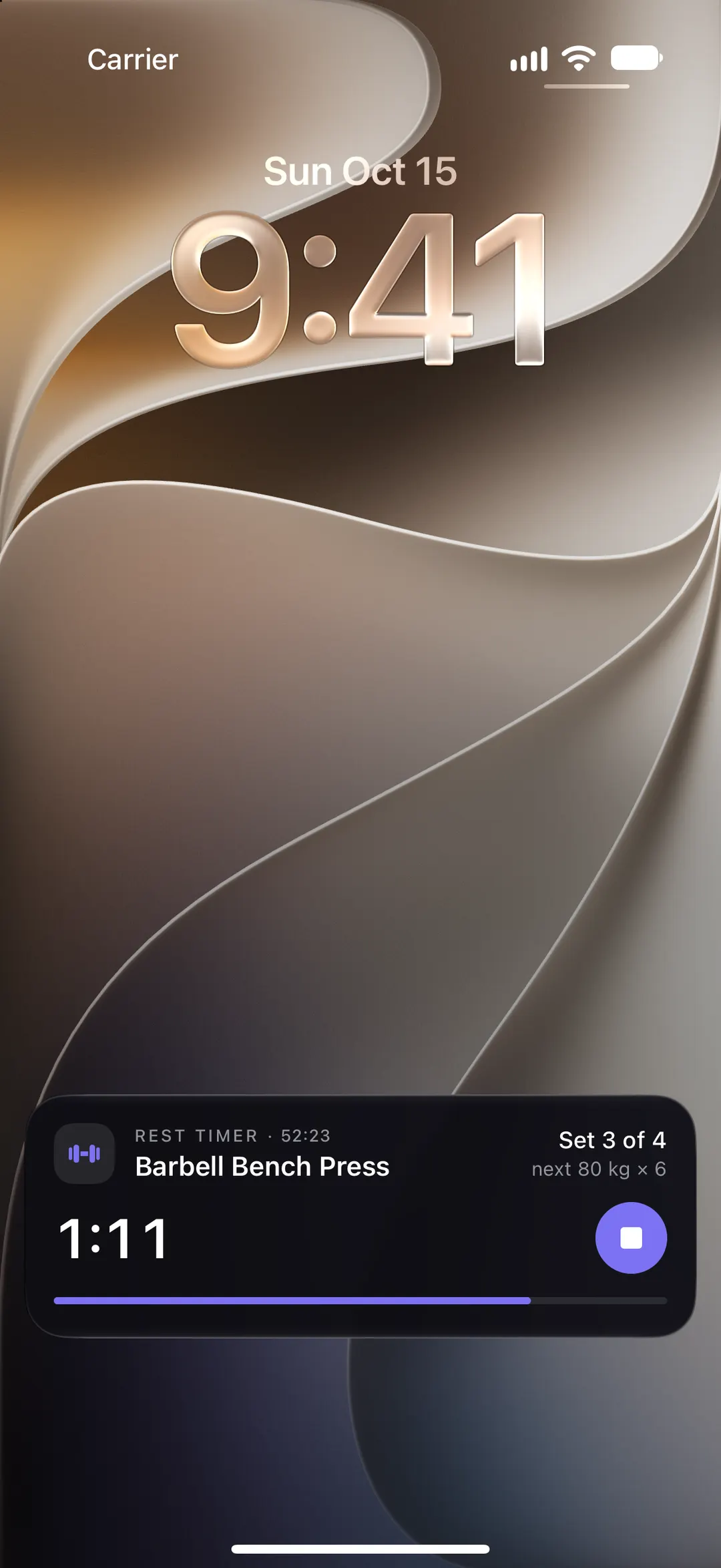 The iPhone Lock Screen with the rest timer counting down as a Live Activity.